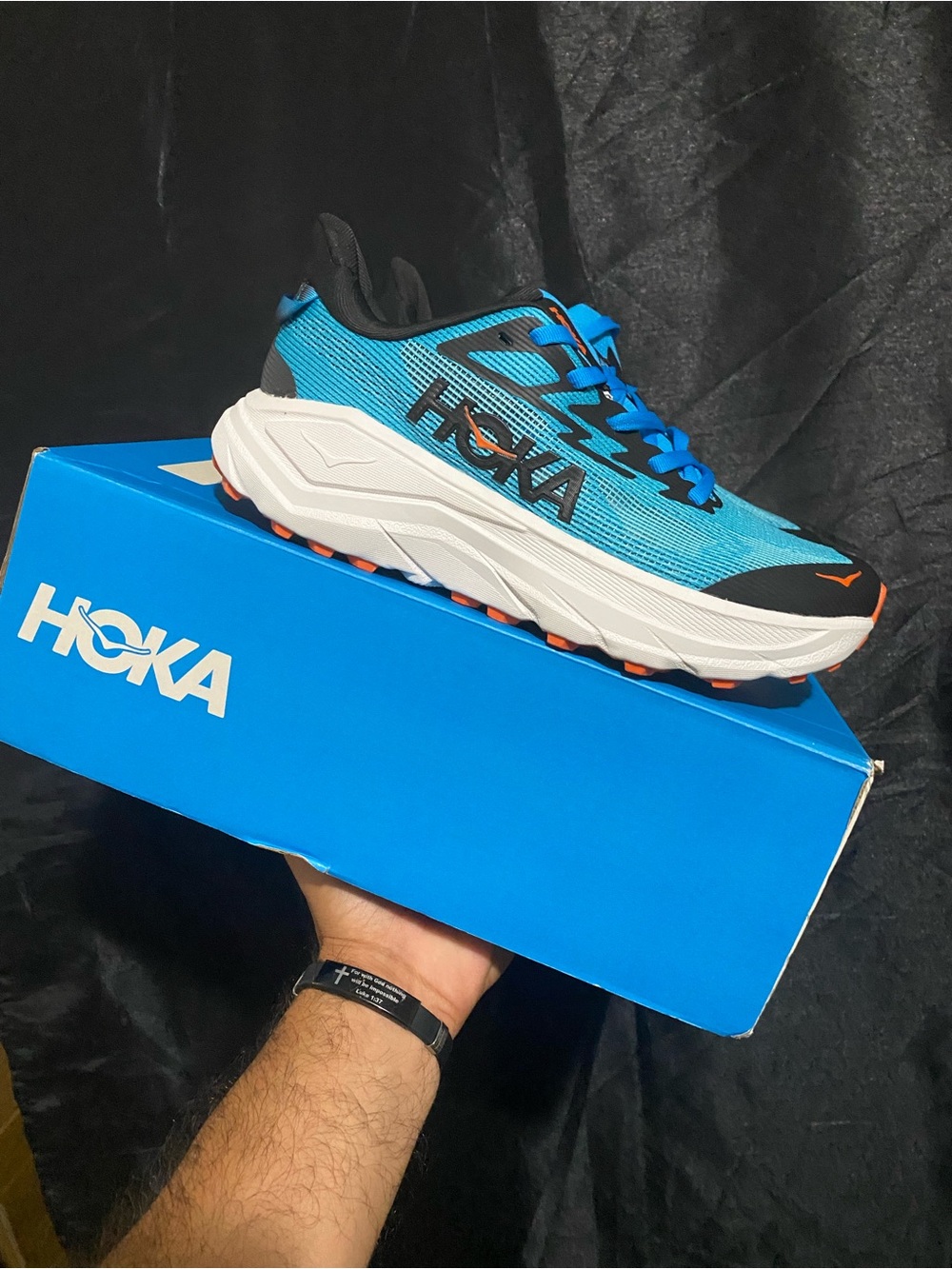Hoka Blue and Black Trail Sneaker with Orange Accents